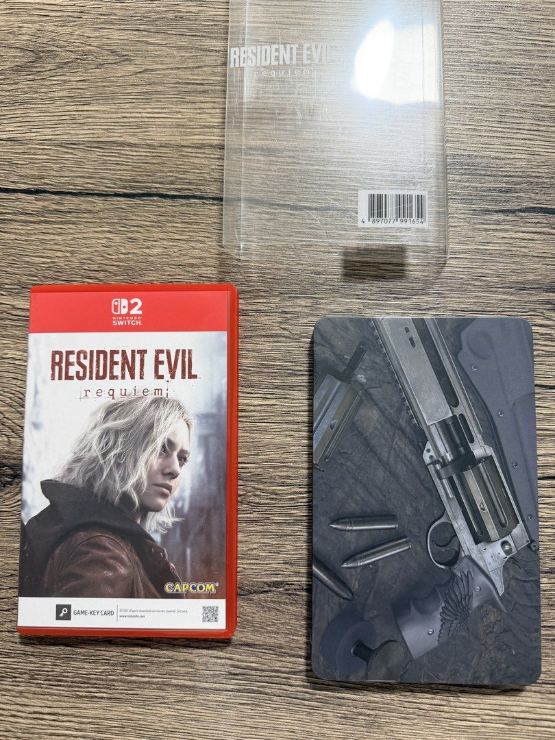 Resident Evil Requiem - FOR SALE (Category: Nintendo) located in Manila. Submitted by hz223 (Listing ID 1427042549, Image 1). Description: Nintendo Switch 2 Game - FOR SALE: Resident Evil Requiem FOR SALE ONLY (not for swap / trade) - Purchased on March 11, 2026, from Data Blitz Online (receipt included) - Comes with a tin case - Unused code (valid only on non-Asian accounts) - Fixed price; price is not negotiable.