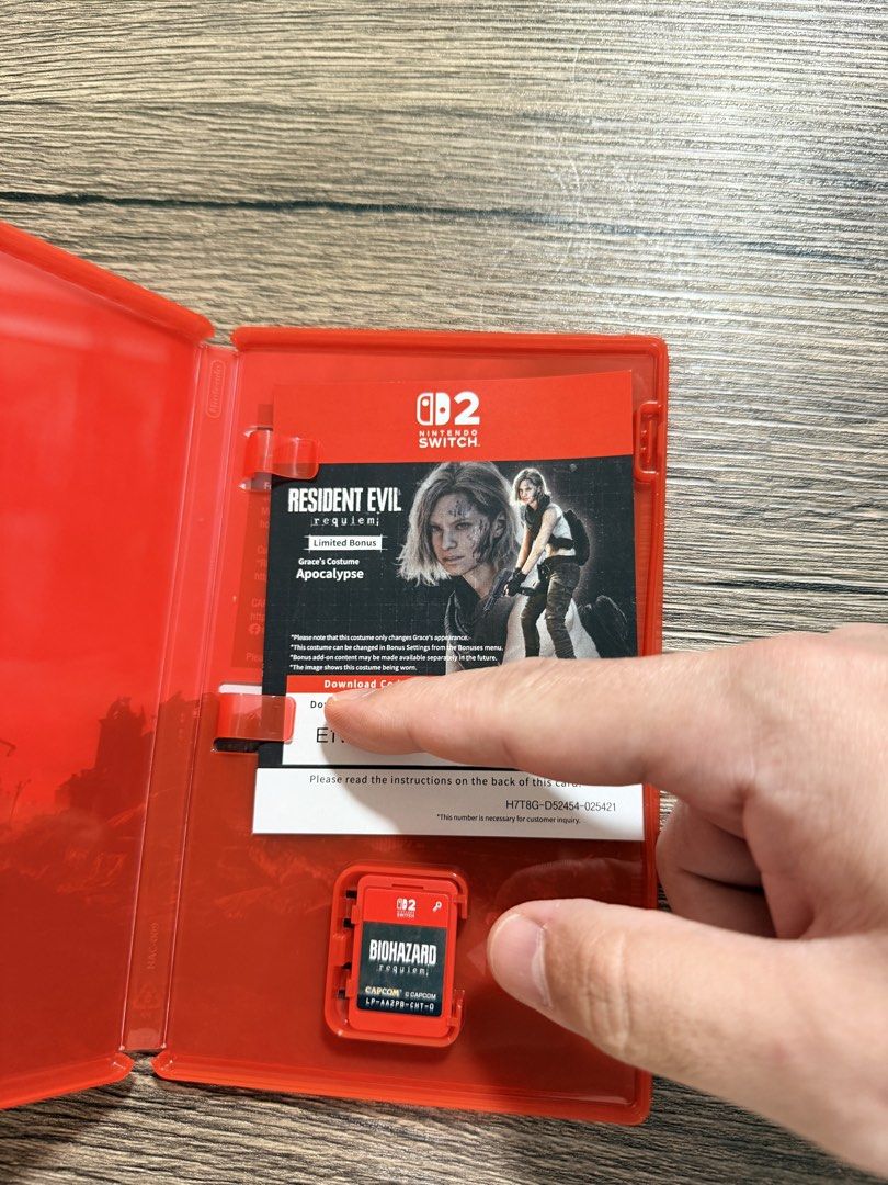 Resident Evil Requiem - FOR SALE (Category: Nintendo) located in Manila. Submitted by hz223 (Listing ID 1427042549, Image 2). Description: Nintendo Switch 2 Game - FOR SALE: Resident Evil Requiem FOR SALE ONLY (not for swap / trade) - Purchased on March 11, 2026, from Data Blitz Online (receipt included) - Comes with a tin case - Unused code (valid only on non-Asian accounts) - Fixed price; price is not negotiable.