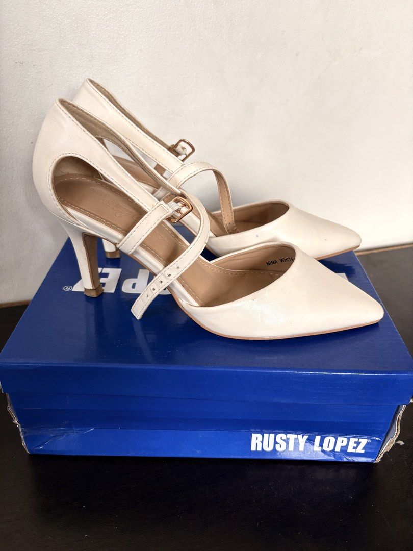 Rusty Lopez Nina White Heels (Category: Heels) located in Manila. Submitted by msmozza (Listing ID 1427023524, Image 2). Description: Used twice only. 1499 orig price. Rfs: got desired design..