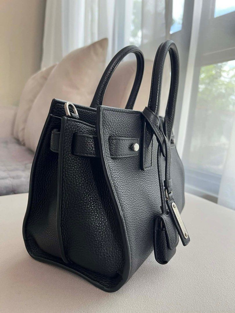 Sac de Jour Nano (Category: Luxury Bags & Wallets) located in Batangas. Submitted by jacwell (Listing ID 1427001595, Image 3). Description: Timeless. Classy. Effortlessly elegant. Perfect statement bag for any outfit. It is a compact, structured bag designed for essentials—such as a phone, keys, and makeup—and features top handles with an adjustable, detachable shoulder strap. ✅💯 original ✅ 9/10 condition ✅ Size: nano (22x18x10.5cm) ✅ With strap