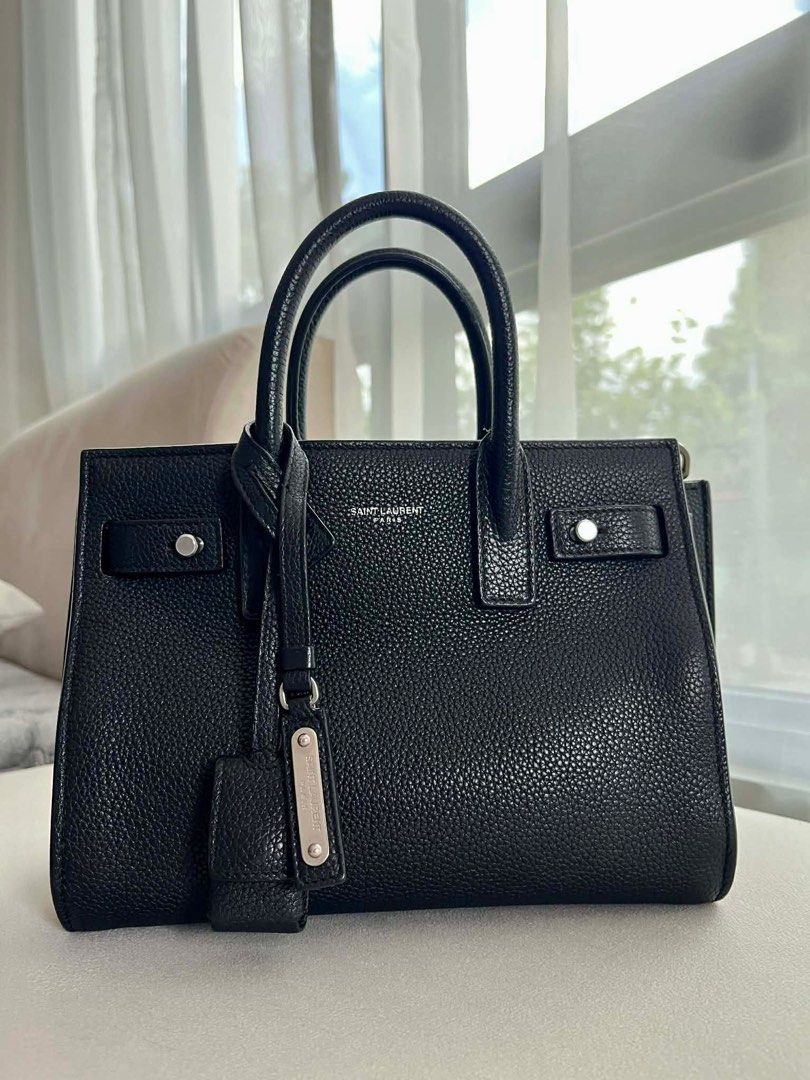 Sac de Jour Nano (Category: Luxury Bags & Wallets) located in Batangas. Submitted by jacwell (Listing ID 1427001595, Image 2). Description: Timeless. Classy. Effortlessly elegant. Perfect statement bag for any outfit. It is a compact, structured bag designed for essentials—such as a phone, keys, and makeup—and features top handles with an adjustable, detachable shoulder strap. ✅💯 original ✅ 9/10 condition ✅ Size: nano (22x18x10.5cm) ✅ With strap