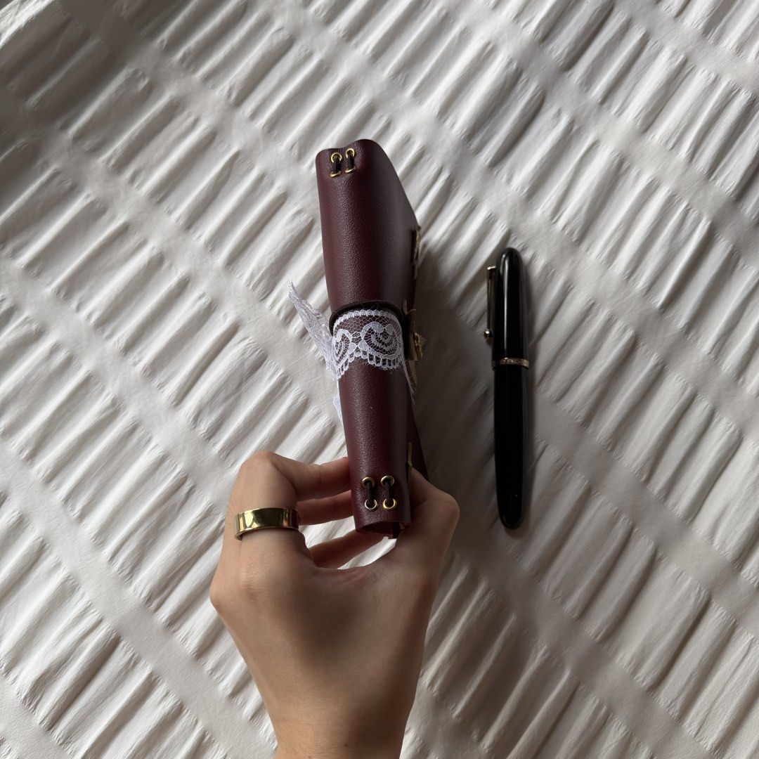 starlet - A6 louise carmen inspired journal! (Category: Stationery & School Supplies) located in Makati City. Submitted by jarchives (Listing ID 1427016413, Image 2). Description: - beautiful burgundy leather with sophisticated gold accents - handmade faux leather journal, super good quality leather! - size: A6, trifold - includes two blank inserts! - comes with the charms & lace, super cute base to add more decor! - negotiable if taking more! mo