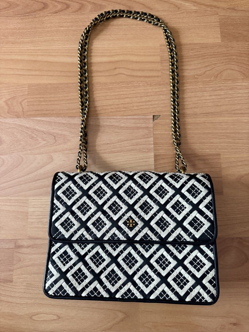 Tory Burch Black and White Shoulder Bag (Category: Luxury Bags & Wallets) located in Cainta. Submitted by clarencegiven15 (Listing ID 1427072718, Image 2). Description: 2 way bag shoulder and crossbody bag leather authentic.