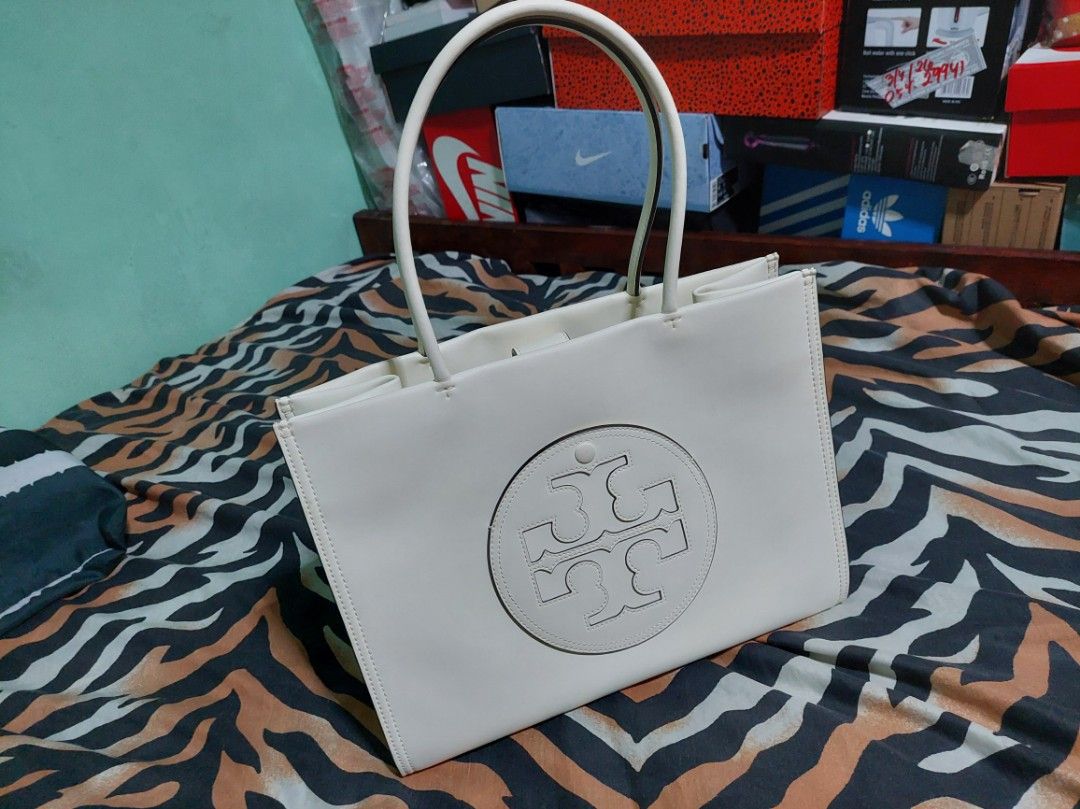 Tory Burch Ella Tote Bag small (Category: Luxury Bags & Wallets) located in Paranaque City. Submitted by erick_e (Listing ID 1427055200, Image 1). Description: 1 pc Tory Burch white Tote Bag Small Used Authentic from Mall Orig Price 13,000 plus Nego Kindly Chat or sms 0916 658 86 08 .