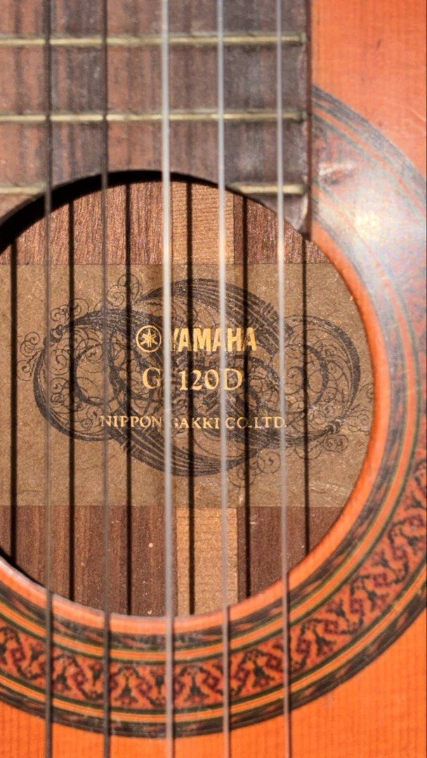 Yamaha G-120D Classical Guitar (Category: Musical Instruments) located in Obando. Submitted by minmin_09 (Listing ID 1427151483, Image 3). Description: Yamaha G120D Classical Guitar 🎸 Well-loved and well-played vintage Yamaha G120D looking for a new home! Perfect for beginners. Free guitar stand No case .