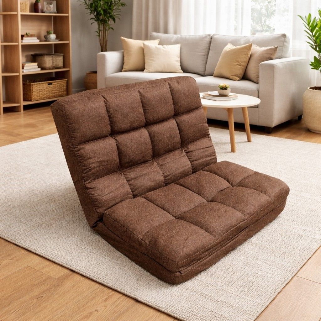 2nd hand Foldavle Tatami Floor Sofa (Category: Sofas) located in Paranaque City. Submitted by 2ndcharmfurniture (Listing ID 1427254752, Image 2). Description: Adjustable floor sofa is perfect for lounging. It features a brown fabric and can be adjusted to multiple positions. Dimensions are L63-165cm, W98cm, and H10-68cm. It's ideal for small spaces or as an extra seating option. The sofa folds flat for easy storage..