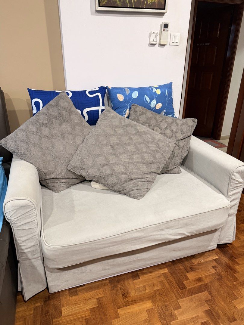 2-Seater Sofa Cum Bed (Category: Sofas) located in Singapore. Submitted by fastdealz07 (Listing ID 1427253583, Image 1). Description: - Converts easily from sofa to bed - Removable cover and washable - Comfortable cushioning and durable fabric - Sturdy frame, lightly used / good condition - Space-saving design, perfect for small homes - Neutral color fits any interior - Cushions come with it - Arrange for own transport.