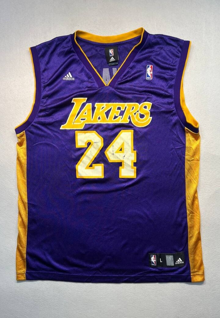 Kobe Bryant Vintage Jersey (Category: Activewear) located in Mandaluyong City. Submitted by theroom501 (Listing ID 1427298240, Image 1). Description: Kobe Bryant Vintage Jersey Condition: Well Size on tag: Large Issue: Cracked print, with lint/pilling, and needs washing. Price: 1500 Details 👇🏼 📐Waist: 23 inches 📐Length: 31 inches 📐Leg Opening: none inches Courier LBC JNT Lalamove.