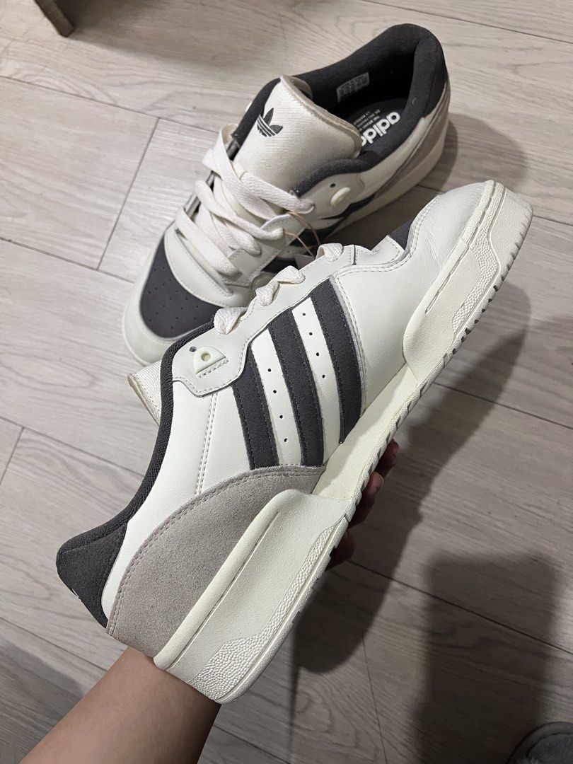 Adidas Rivalry Low Shoes (Category: Sneakers) located in Quezon City. Submitted by dolly_girl_stuffs (Listing ID 1427296804, Image 2). Description: Original Adidas Rivalry Low Shoes - Beige With Tag, Fitted, No Box Size: US 12 | UK 11.5 Original price: Php 3000 Price still negotiable. RFS: Big size, unused Payment first via GCash .