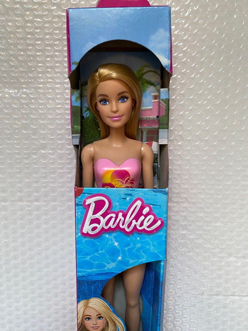 Barbie Doll in Swimsuit (Category: Kids Toys) located in Abucay. Submitted by abpshop (Listing ID 1427202615, Image 2). Description: Brandnew barbie beach doll , no issue, sold as is MOP: Gcash + SF Location: Bataan Courier: J&T Express.