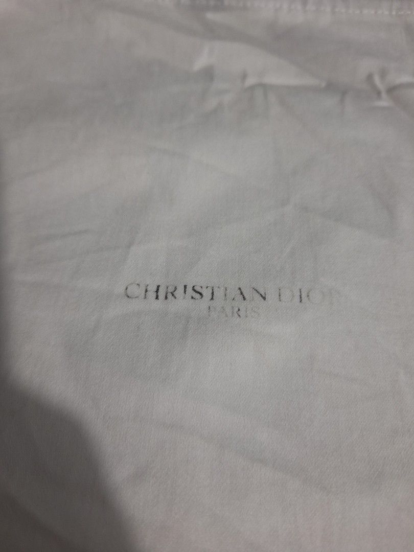 Christian Dior Dust Bag (Category: Luxury Bags & Wallets) located in Sibulan. Submitted by studioxano (Listing ID 1427195995, Image 2). Description: dior dust bag fade print height 10.8 / Width 9.8.
