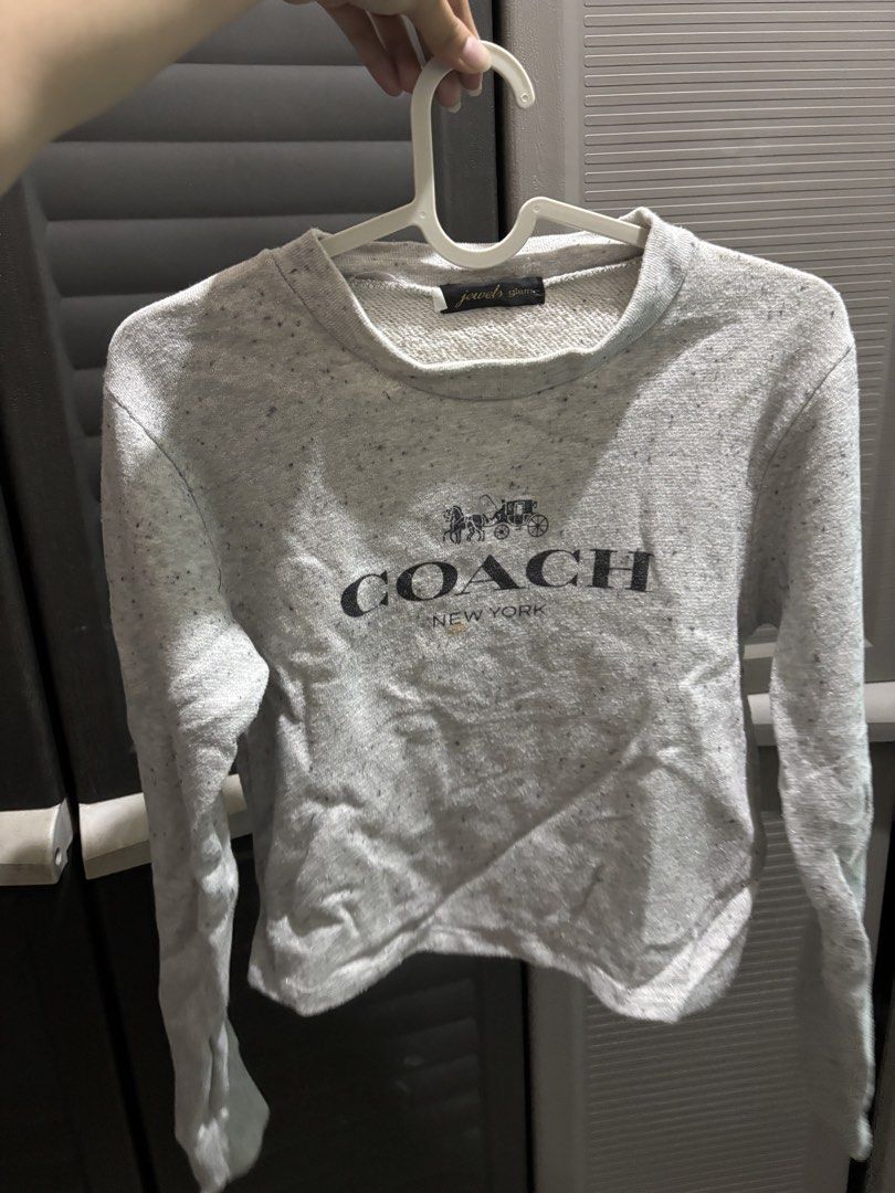 Coach New York Cropped Sweatshirt (Category: Coats, Jackets and Outerwear) located in Caloocan City. Submitted by aclyy (Listing ID 1427230889, Image 1). Description: DECLUTTERING - preloved - small stain in front mop: qr/maya/maribank mod: lalamove.