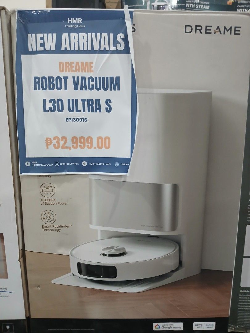 Dreame L30 Ultra S Robot Vacuum (Category: Vacuum Cleaner & Housekeeping) located in Manila. Submitted by sc_arvin (Listing ID 1427241907, Image 1). Description: Dreame L30 Ultra S is a robot vacuum. It features 7,000Pa of suction power and smart pathfinding technology. The box shows the product and its self-cleaning base. The price is ₱32,999.00. The model number is EP130916..