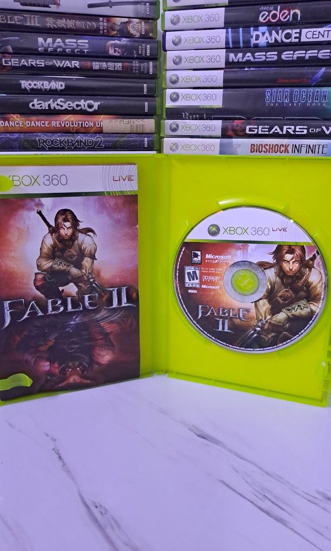 Fable II Xbox 360 Game (Category: Xbox) located in Muntinlupa City. Submitted by echo.066 (Listing ID 1427273532, Image 2). Description: FOR SALE XBOX 360 CD GAME 750 PHP FABLE II NTSC MINT CONDITION AVAILABLE FOR DELIVERY VIA LALAMOVE AVAILABLE FOR SHIPPING VIA J&T EXPRESS MODE OF PAYMENT : BANK / GCASH / MAYA Check my PROFILE for more CDs MUSIC / GAMES / MOVIE MUNTINLUPA CITY LOCATION .
