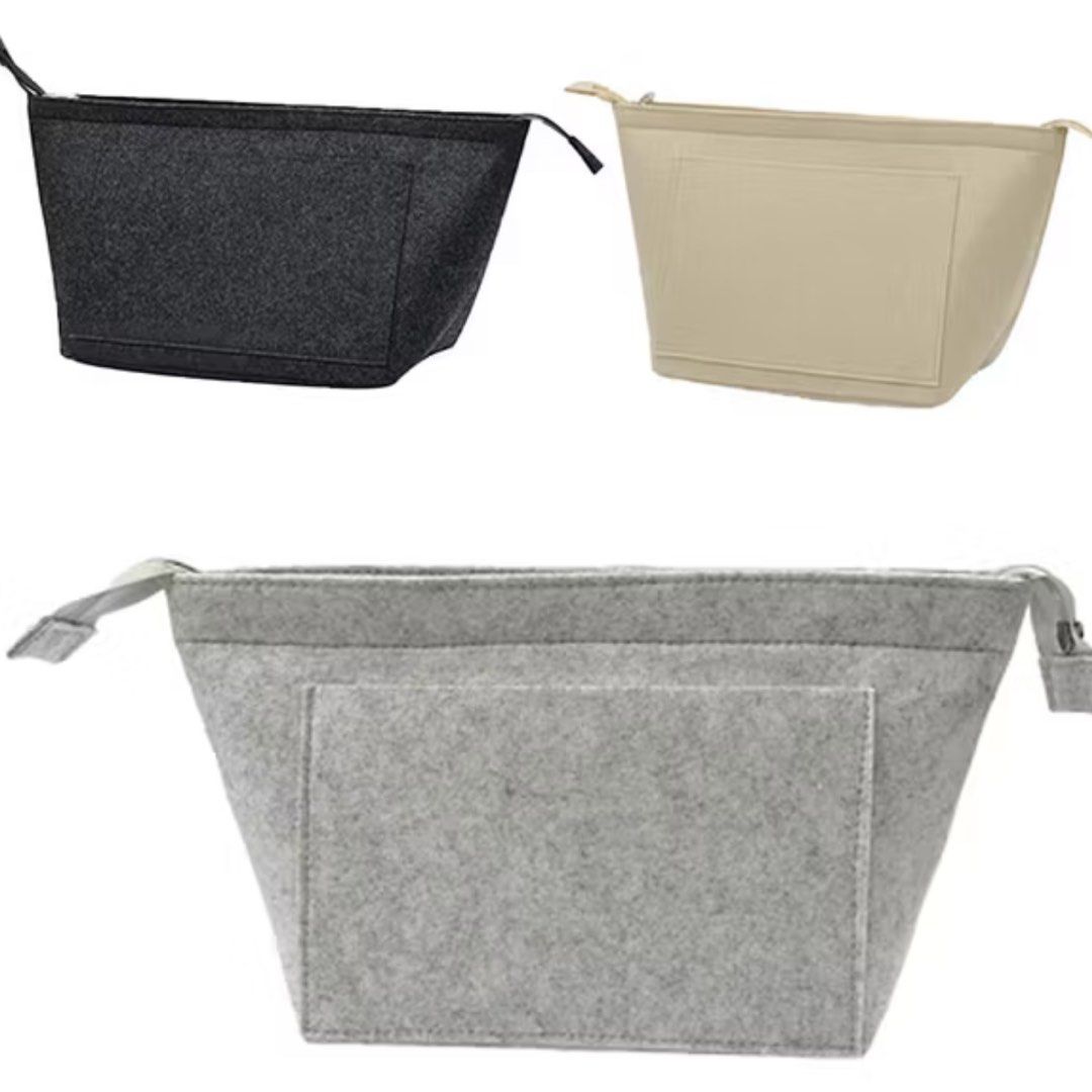 Felt Bag Organizer Insert Pouch with Zipper - Large Black Dark Gray (Category: Purses & Pouches) located in Manila. Submitted by pippintook (Listing ID 1427250014, Image 1). Description: - Size Large, brand new - With zipper - really useful for bags with no zip for anti theft - Color black/dark grey - RFS: bought the wrong size.