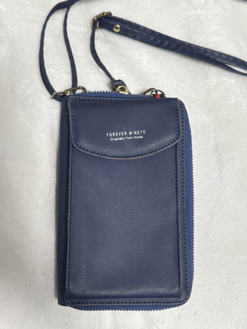 Forever Mineyo Crossbody Wallet Bag (Category: Cross-body Bags) located in Rizal. Submitted by declutteryph (Listing ID 1427309165, Image 1). Description: Good condition detachable string strap can be used as cellphone holder and wallet .