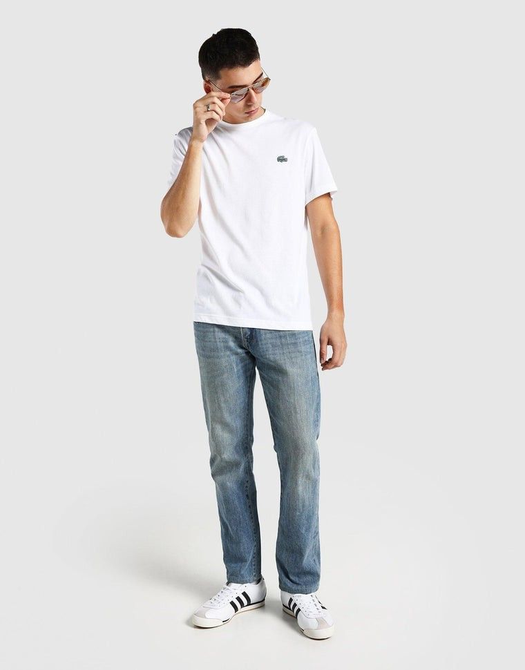 FREE SHIPPING EXCLUSIVE Lacoste White T-Shirt (Category: Tshirts & Polo Shirts ) located in Quezon City. Submitted by wcfhomeandoffice (Listing ID 1427312826, Image 2). Description: This cotton blend jersey T-shirt features a classic crew neck and short sleeves for everyday comfort, finished with a front silicone logo patch for a sleek, sporty touch. Care & Material: 65% cotton, 35% polyester Colour: White.
