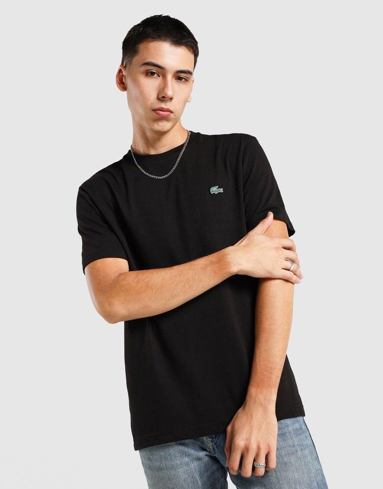 FREE SHIPPING EXCLUSIVE Lacoste Black T-Shirt (Category: Tshirts & Polo Shirts ) located in Quezon City. Submitted by wcfhomeandoffice (Listing ID 1427312925, Image 1). Description: The Lacoste Urban Logo T-Shirt in Black combines everyday comfort with standout branding for a modern, sleek look. Crafted from soft cotton jersey, it features a classic crew neckline and relaxed fit for all-day wear. A bold Lacoste logo across the chest makes a state