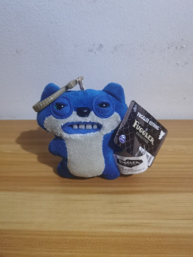Fuggler - Suspicious Fox Plush Charm (Category: Plushies & Soft Toys) located in Taguig. Submitted by kalabasza (Listing ID 1427241115, Image 1). Description: 📌 Brand New with Paper Tag. 📌 Actual item posted. 📌 Item is in good condition. 📌 Product Color may slightly vary due to Photographic Lighting. 📌 Location: Taguig 📌 MOP: GCash. Payment first before ship. 📌 MOD: J&T, LBC, GoGo or Lalamove. 📌 DF/SF at buyer's expense. 📌 No rush shippi