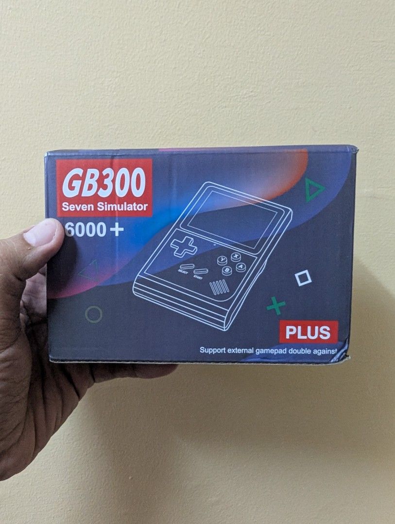 GB300 Retro game console 6000 games (Category: Others) located in Quezon City. Submitted by unboxingtito (Listing ID 1427308119, Image 1). Description: Brand new and unused. GB300 6000 games.