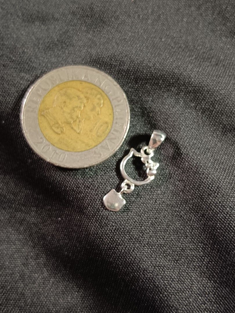 100% Legit 925 Silver Hello Kitty Pendant (Category: Charms) located in Manila. Submitted by mhar_declutter (Listing ID 1427235476, Image 2). Description: Silver Hello Kitty Pendant TUNAY NA SILVER Silver Hello Kitty Pendant TUNAY NA SILVER.