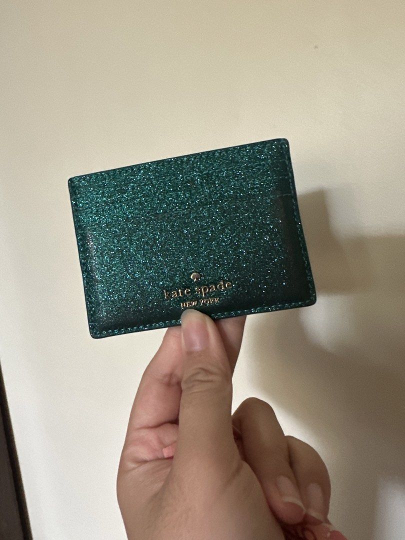Kate Spade Green Glitter Card Holder (Category: Wallets & Card holders) located in Makati City. Submitted by danielleanthea (Listing ID 1427173254, Image 1). Description: Purchased in malaysia. Amount equivalent to 6500 pesos. RFS: NEED FUNDS.