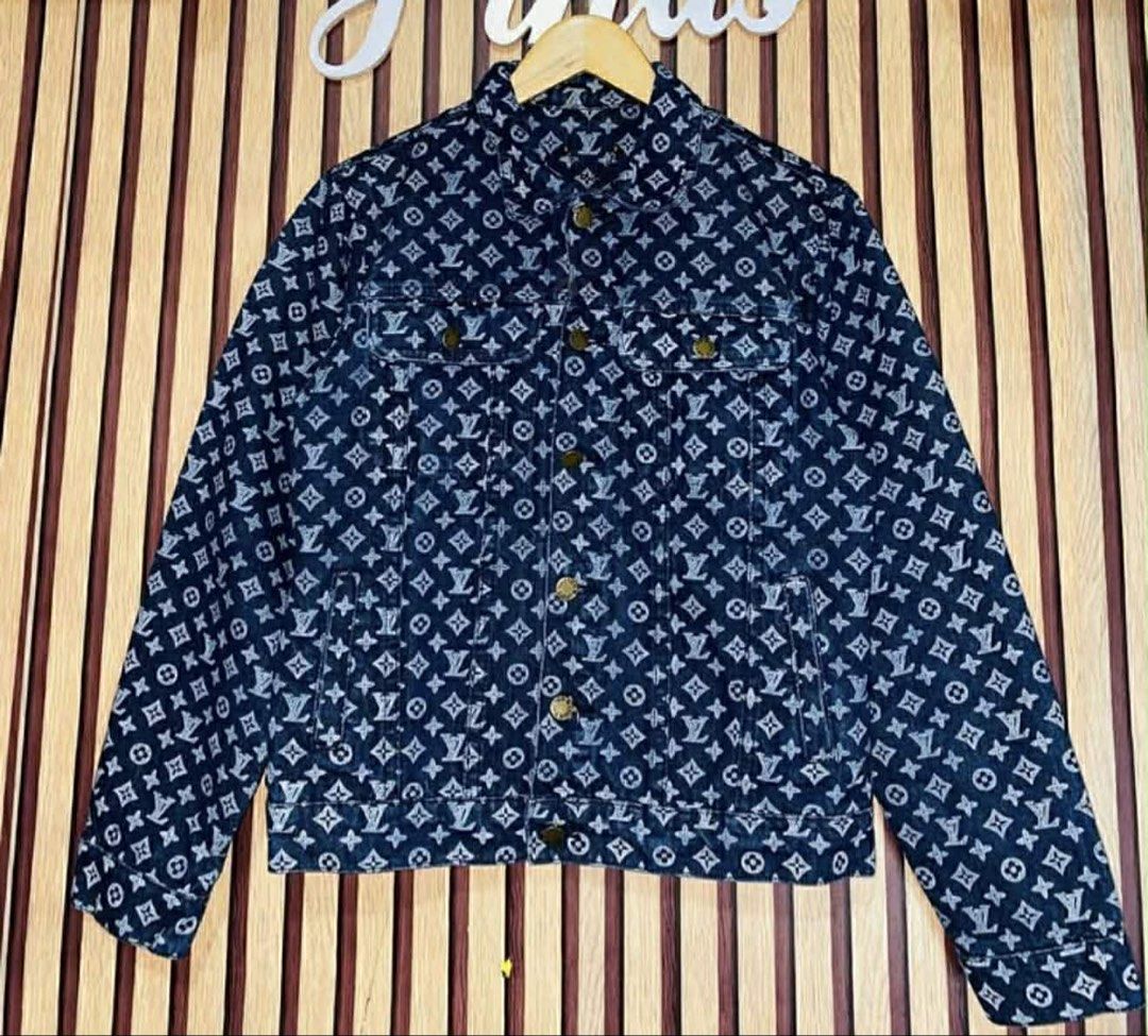 Louis Vuitton Navy Blue Monogram Denim Jacket XXL (Category: Coats, Jackets and Outerwear) located in Baguio. Submitted by CherryPickedShop (Listing ID 1427204876, Image 3). Description: Authentic Louis Vuitton denim jacket in navy blue with the iconic monogram print. Features a classic button-up design with two chest pockets. The jacket is size XXL. Made from 100% cotton. Includes a leather patch with the Louis Vuitton logo. The jacket has gold-