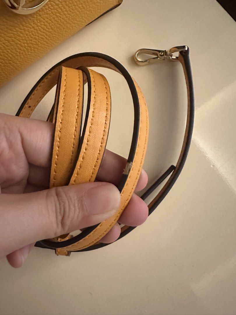 Michael Kors Mercer Small Top-Handle Bag (Category: Luxury Bags & Wallets) located in Manila. Submitted by lucky.macherie (Listing ID 1427238355, Image 2). Description: Michael Kors Mercer bag features a top handle and a detachable shoulder strap. Mustard yellow color Issues: Minimal rubs on piping (strap and handle) In very good condition, ang ganda ng leather, very vibrant color, hardware gold na gold pa with no tarnishing.