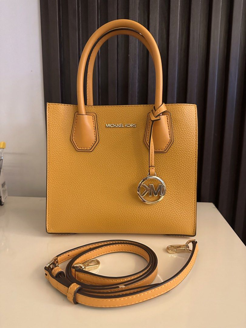 Michael Kors Mercer Small Top-Handle Bag (Category: Luxury Bags & Wallets) located in Manila. Submitted by lucky.macherie (Listing ID 1427238355, Image 1). Description: Michael Kors Mercer bag features a top handle and a detachable shoulder strap. Mustard yellow color Issues: Minimal rubs on piping (strap and handle) In very good condition, ang ganda ng leather, very vibrant color, hardware gold na gold pa with no tarnishing.