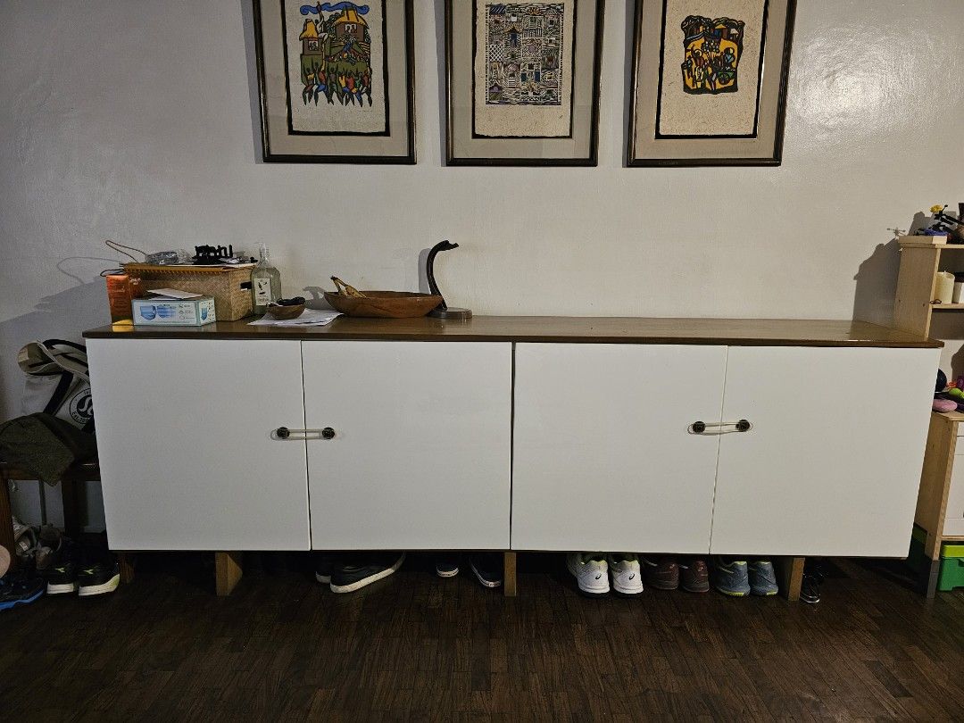 Mid-Century Modern Cabinet (Category: Shelves, Cabinets & Racks) located in Pasig City. Submitted by erimurr (Listing ID 1427166646, Image 2). Description: - ikea Besta hack with wooden top and legs - Baby proofing handles can be removed - Sleek design - Can be used as buffet or entertainment table.