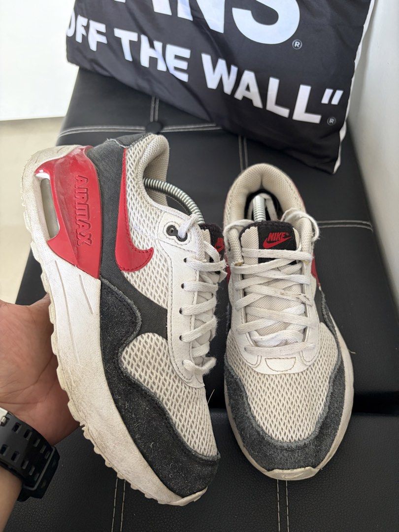 Nike Air Max 1 Sneakers (Category: Sneakers) located in Bulacan. Submitted by kellinquinn (Listing ID 1427237775, Image 1). Description: - Nike Air Max 1 sneakers - Color: White, red, and black - Size: US 5Y - Features Nike Air logo - Visible mesh material - White laces - Signs of wear on soles and uppers.