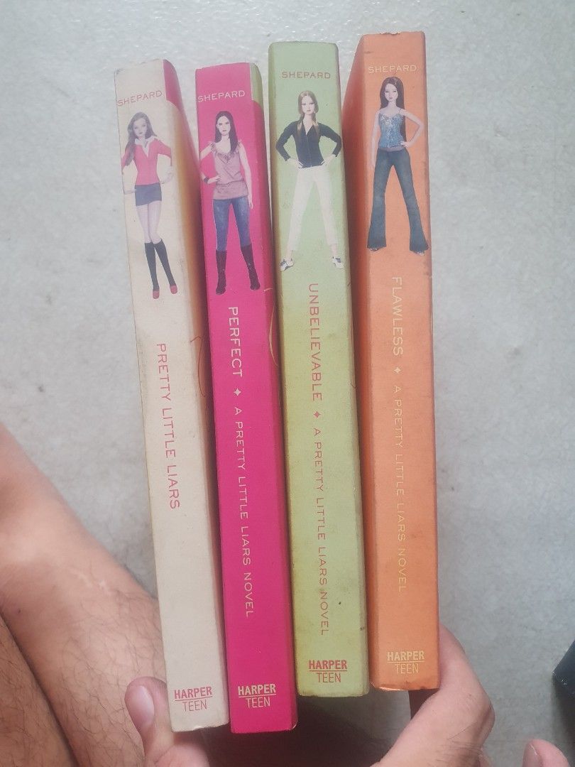 Pretty Little Liars Book Set (Category: Storybooks) located in San Pablo. Submitted by happyflower_4a9f30 (Listing ID 1427183515, Image 3). Description: Set of four books from the Pretty Little Liars series. Titles include "Flawless", "Unbelievable", "Perfect", and "Pretty Little Liars". The books are paperback and feature colorful covers with images of the characters. The author is Sara Shepard. The books are in English..