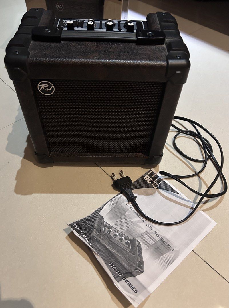 RJ Acoustic Junior AC10 Guitar Amplifier (Category: Musical Instruments) located in Mandaluyong City. Submitted by sgauze (Listing ID 1427273714, Image 1). Description: PLEASE READ / Ugaliing mag-basa ng maayos 🙏 1.) RJ Acoustic Junior AC10 Guitar Amplifier. This is a SMALL amplifier specifically made for acoustic guitars. It can double as a speaker. 2.) OG price: 3k. Why 2,700 resale?: - No defects, ilang taon na sakin (about a decade, more or 