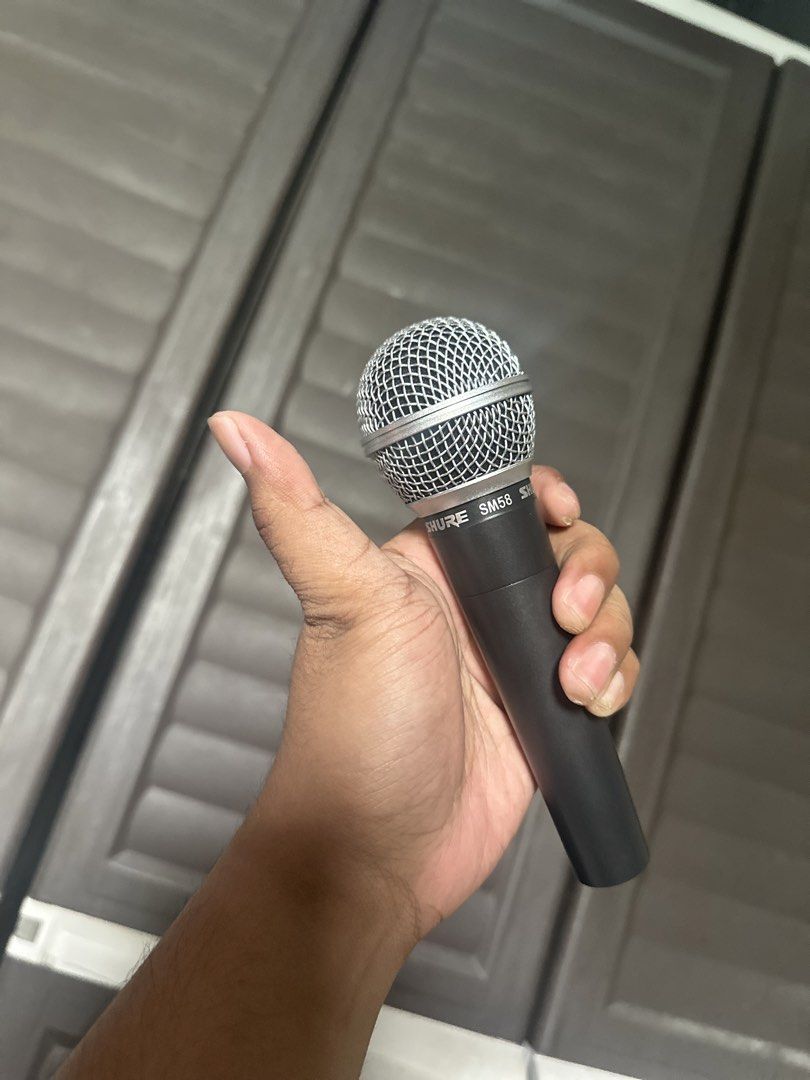 Shure SM58 Microphone (Category: Microphones) located in Paranaque City. Submitted by antonmiguelreyesdavid2-63161 (Listing ID 1427234165, Image 2). Description: Shure SM 58 (High quality duplicate) Last 5 Stocks.‼️‼️‼️ Been using the same Shure SM58 Dup since 2021 for my gigs. (Proof that this item is quality and durable.) I can send you videos of me using the same mic for your reference. Available for meet up around Paranaque City. Lalamove or 