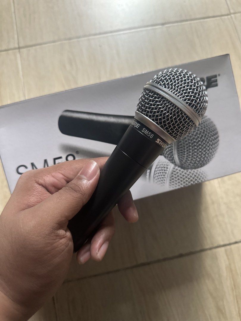 Shure SM58 Microphone (Category: Microphones) located in Paranaque City. Submitted by antonmiguelreyesdavid2-63161 (Listing ID 1427234165, Image 1). Description: Shure SM 58 (High quality duplicate) Last 5 Stocks.‼️‼️‼️ Been using the same Shure SM58 Dup since 2021 for my gigs. (Proof that this item is quality and durable.) I can send you videos of me using the same mic for your reference. Available for meet up around Paranaque City. Lalamove or 