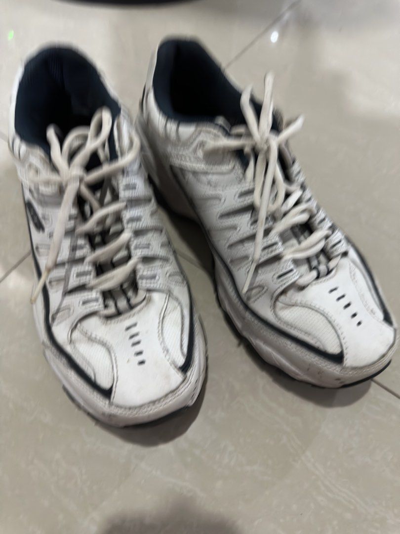 Skechers Wide Fit Sneakers (Category: Sneakers) located in Manila. Submitted by randomdeclutter (Listing ID 1427272421, Image 2). Description: White Skechers sneakers with black accents. Features a lace-up closure. The shoes have a wide fit design. Dirt marks. Get it cleaned and it will look brand new .