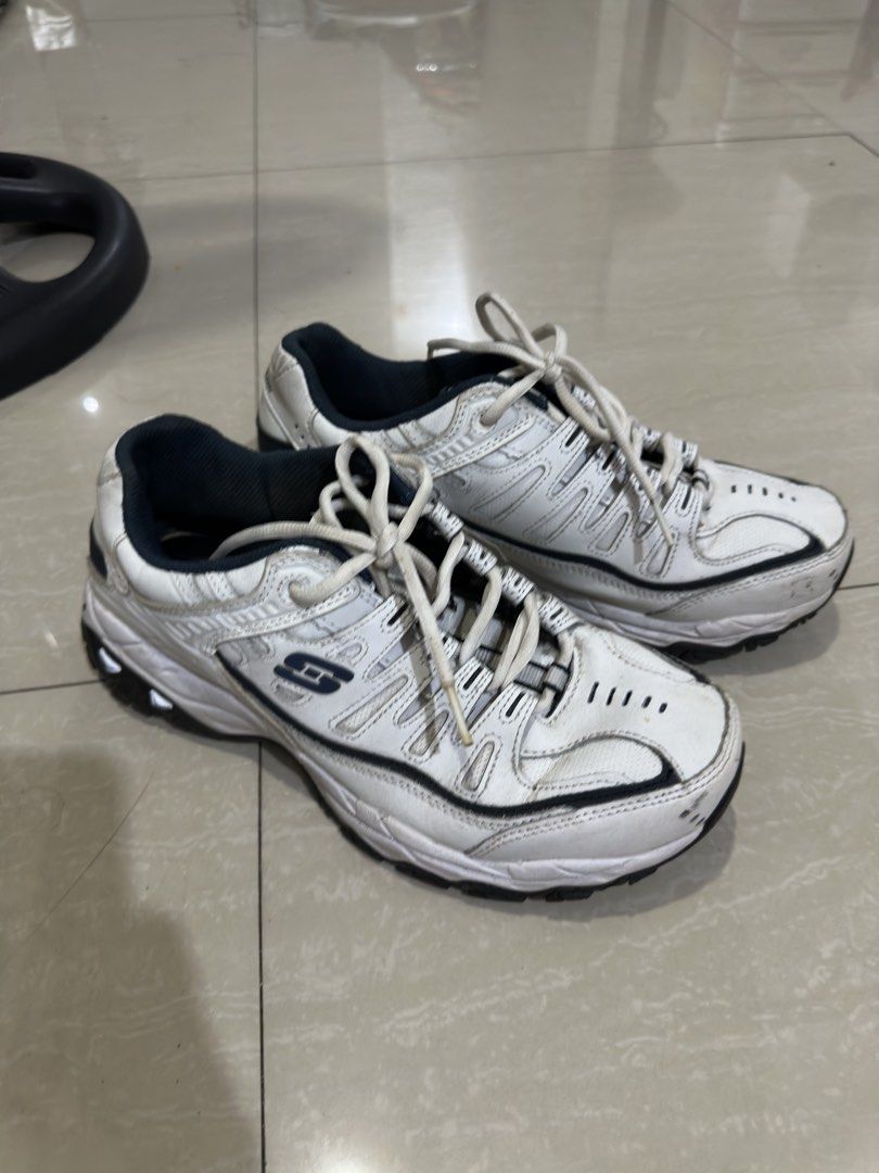 Skechers Wide Fit Sneakers (Category: Sneakers) located in Manila. Submitted by randomdeclutter (Listing ID 1427272421, Image 1). Description: White Skechers sneakers with black accents. Features a lace-up closure. The shoes have a wide fit design. Dirt marks. Get it cleaned and it will look brand new .