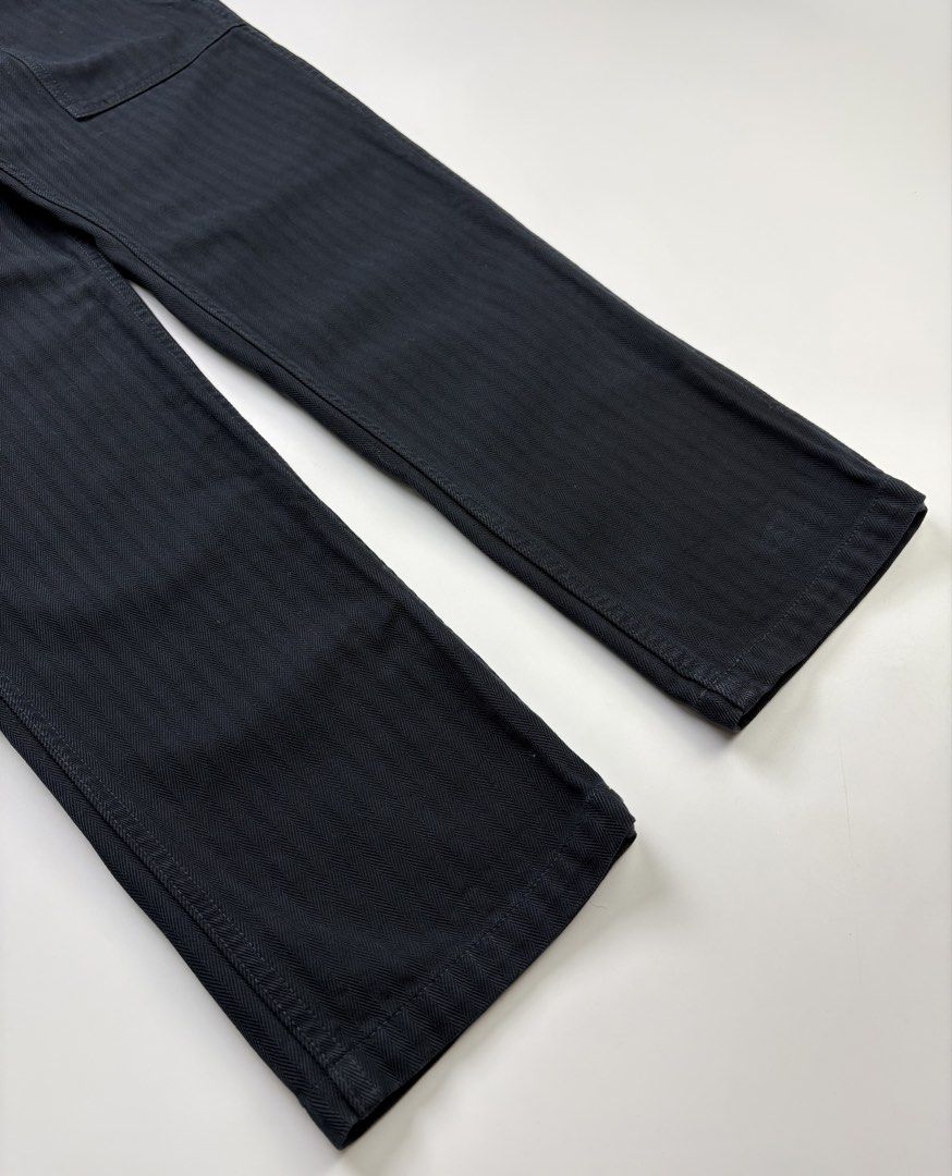 S/S19 Visvim Cropped Herringbone Drill Mil Pants (Category: Trousers) located in Cavite. Submitted by sc_rcity (Listing ID 1427299968, Image 3). Description: Tagged Size : 2 / 30 Men’s Authentic Made in Japan Color : Navy Blue Condition : Excellent 9.8/10 Zipper : Ykk No Inclusion Note : The first photo shows how it looks like when worn. Waist 15 Length 35 Front rise 11 Inseam 25 Leg op. 6.5.