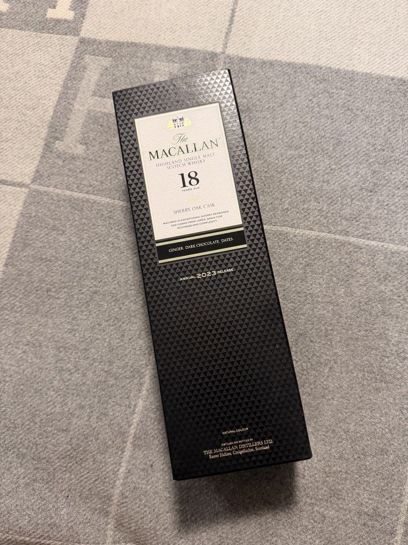 The Macallan 18 Years Old Sherry Oak Cask (Category: Beverages) located in Pasig City. Submitted by donmsamson (Listing ID 1427226530, Image 2). Description: Macallan 18 Years Old Sherry Oak Cask. Annual 2023 Release. Features notes of ginger, dark chocolate, and dates. The bottle is presented in its original box. A premium single malt Scotch whisky..