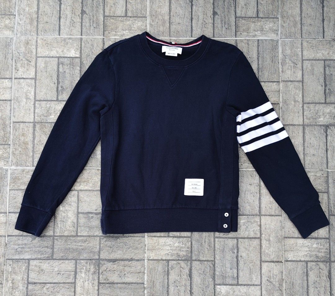 Thom Browne Navy Sweatshirt with White Stripes (Category: Luxury Apparel) located in Santiago. Submitted by jelkompany2023 (Listing ID 1427170155, Image 1). Description: small to medium. Excellent condition. Authenticity Guaranteed MADE IN JAPAN.