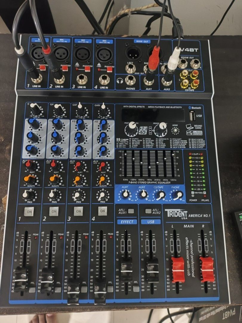Trident PV-4BT 4-Channel Passive Mixer (Category: Soundbars, Speakers & Amplifiers) located in Quezon City. Submitted by yamyam.yamyam (Listing ID 1427225357, Image 1). Description: The TRIDENT PV-4BT 4 Channel Compact Mixer with built-in sound card and 99DSP effects EQ is a must-have for any music enthusiast or professional. Compact and Versatile: This mixer is compact, making it easy to carry around. It has four channels which allow you to conn