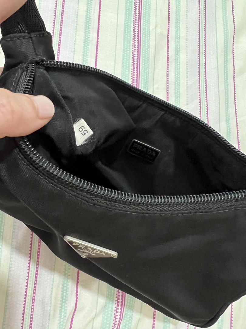 Vintage Prada Black Nylon Hobo Bag (Category: Luxury Bags & Wallets) located in Manila. Submitted by reedcruz (Listing ID 1427204765, Image 3). Description: Authentic Vintage Prada nylon bag In excellent condition Sides are okay No major flaws .