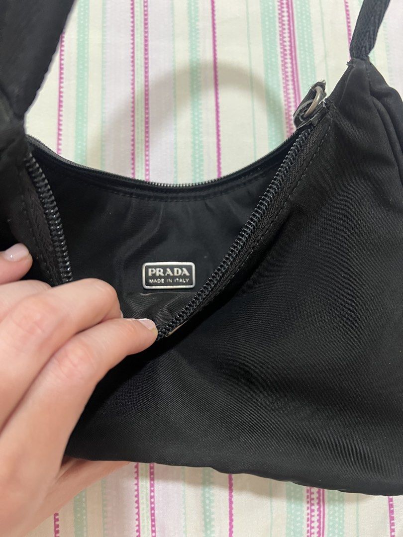 Vintage Prada Black Nylon Hobo Bag (Category: Luxury Bags & Wallets) located in Manila. Submitted by reedcruz (Listing ID 1427204765, Image 2). Description: Authentic Vintage Prada nylon bag In excellent condition Sides are okay No major flaws .