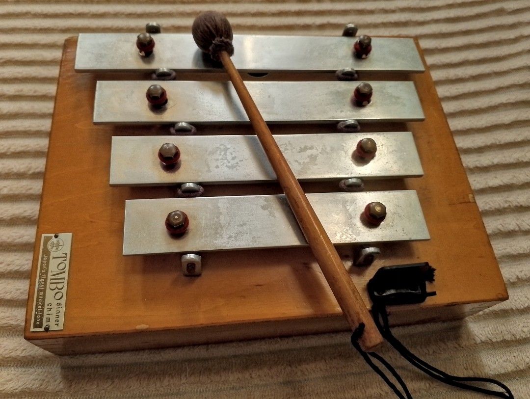 Vintage Tombo Dinner Chime Xylophone (Category: Musical Instruments) located in Binangonan. Submitted by stufflikedat (Listing ID 1427258141, Image 1). Description: Vintage Tombo dinner chime xylophone ideal for restaurants, catering service, retreat house, or for collection, a type of mallet percussion instrument featuring 4 metal bars mounted on a wooden resonating box. Typically used to produce musical notes for dining announcements or as a pr