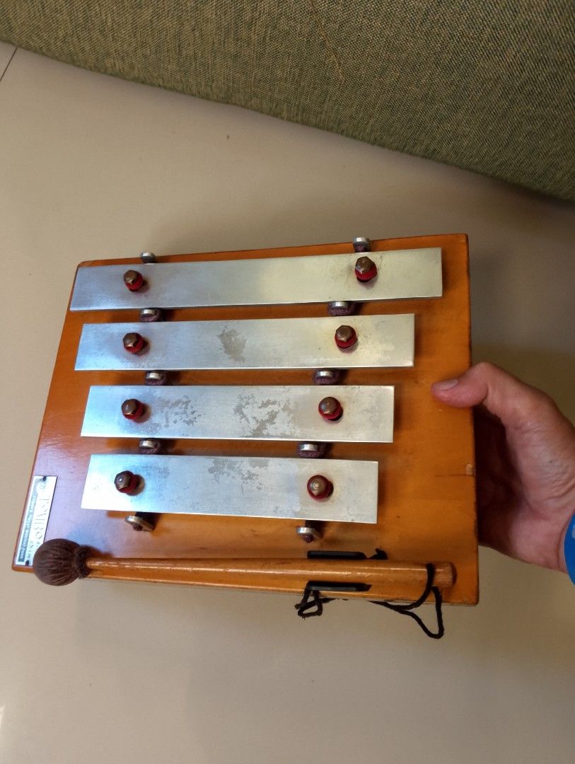 Vintage Tombo Dinner Chime Xylophone (Category: Musical Instruments) located in Binangonan. Submitted by stufflikedat (Listing ID 1427258141, Image 3). Description: Vintage Tombo dinner chime xylophone ideal for restaurants, catering service, retreat house, or for collection, a type of mallet percussion instrument featuring 4 metal bars mounted on a wooden resonating box. Typically used to produce musical notes for dining announcements or as a pr