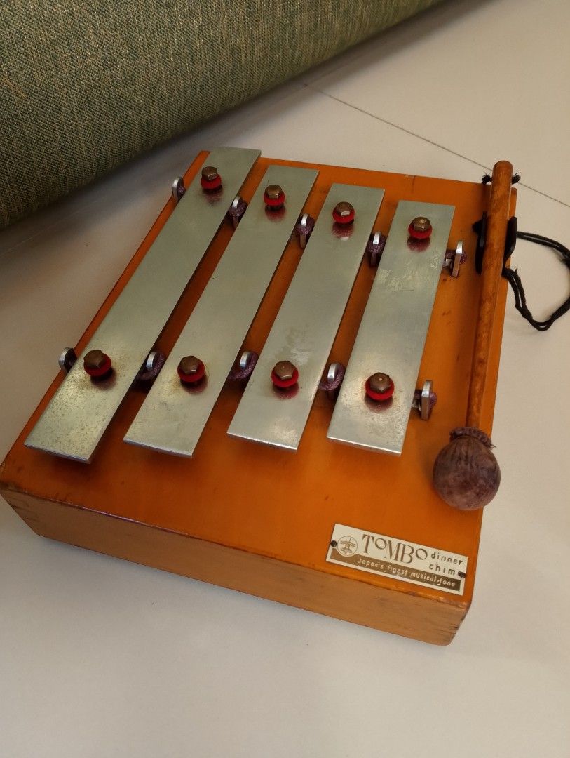 Vintage Tombo Dinner Chime Xylophone (Category: Musical Instruments) located in Binangonan. Submitted by stufflikedat (Listing ID 1427258141, Image 2). Description: Vintage Tombo dinner chime xylophone ideal for restaurants, catering service, retreat house, or for collection, a type of mallet percussion instrument featuring 4 metal bars mounted on a wooden resonating box. Typically used to produce musical notes for dining announcements or as a pr