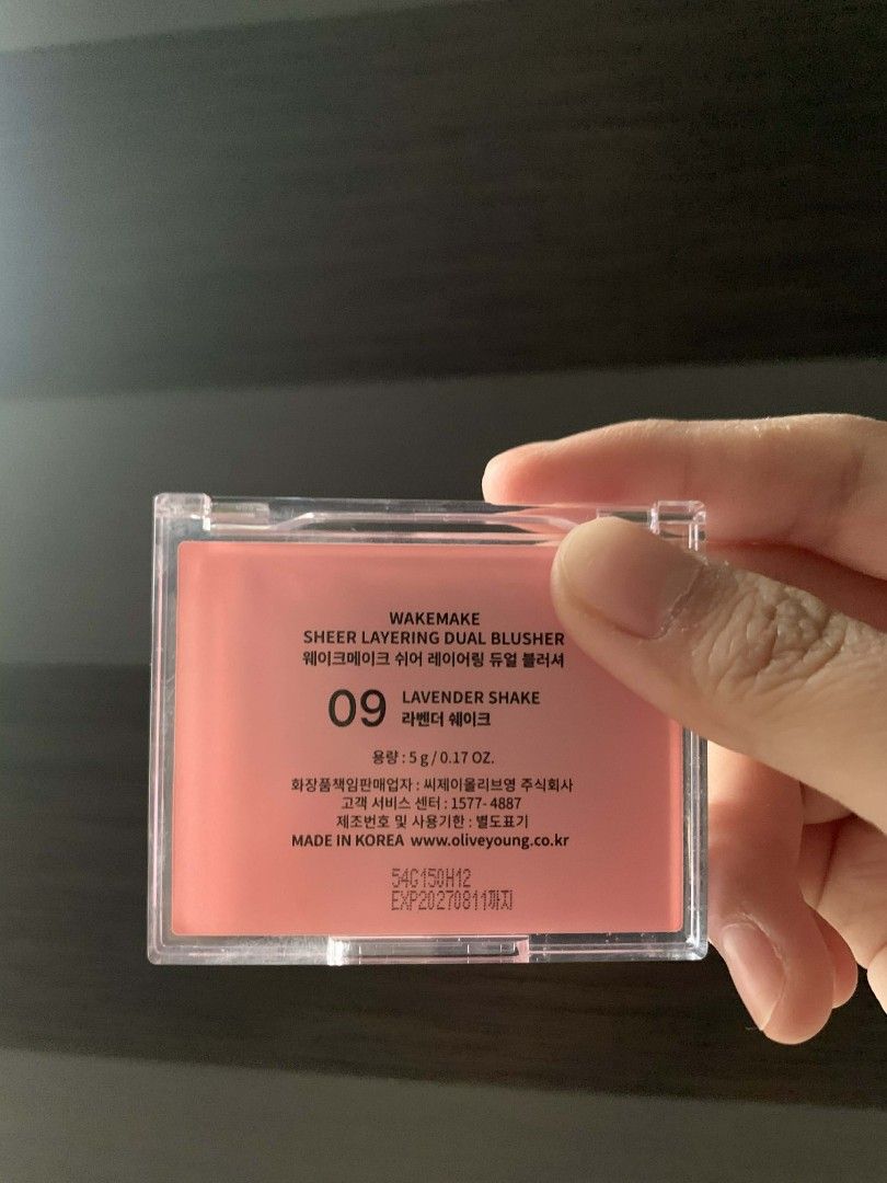 Wakemake Sheer Layering Dual Blusher - 09 Lavender Shake (Category: Makeup) located in Meycauayan. Submitted by 2023luxuryforless (Listing ID 1427225412, Image 2). Description: Wakemake Sheer Layering Dual Blusher in shade 09 Lavender Shake. This blush is a dual-tone product. The packaging includes the product name, shade number, and other details. It is made in Korea. The net weight is 5g / 0.17 OZ..