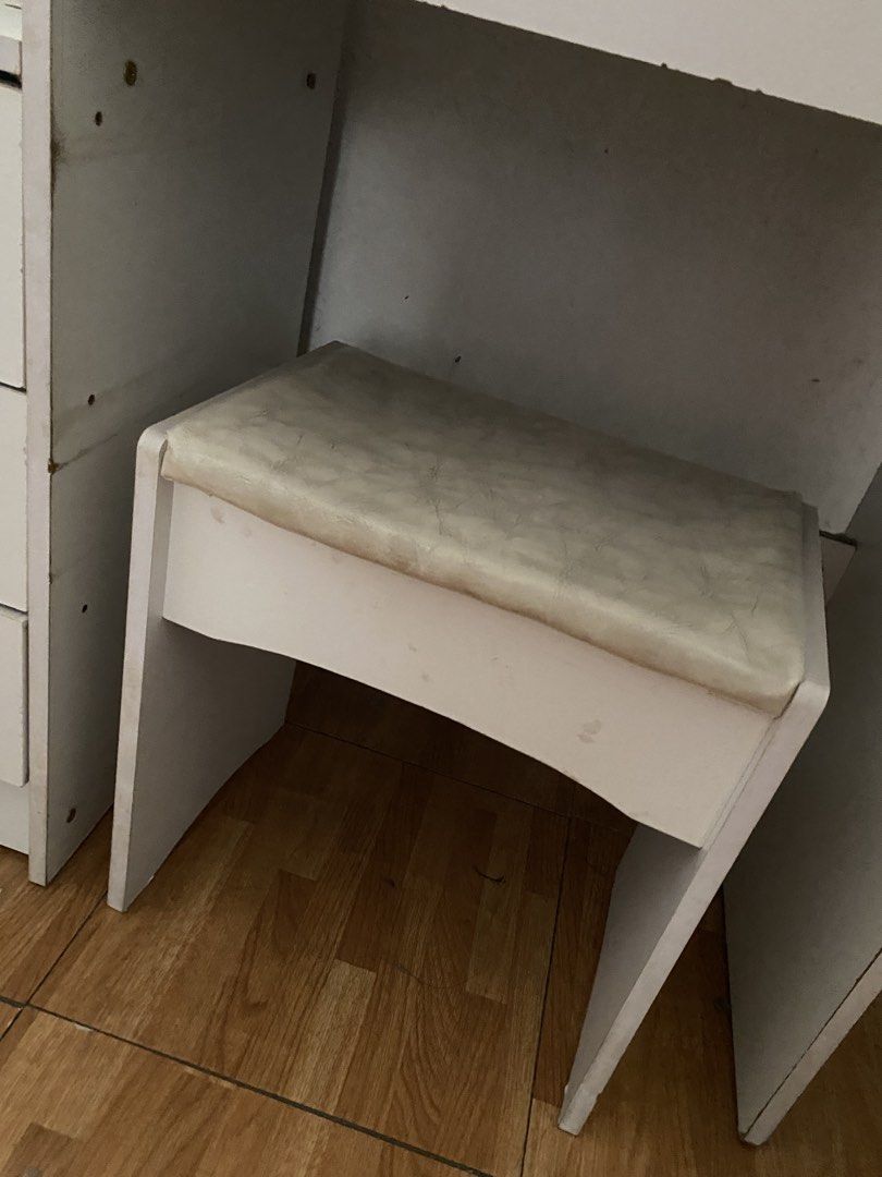 RUSH ‼️ white vanity table (with stool) 🤍 (Category: Tables & Sets) located in Quezon City. Submitted by closetbybella (Listing ID 1427171226, Image 2). Description: - just needs deep cleaning but overall, maayos pa siya - comes with the key for the bigger compartment - message me for more info 🤍 - badly need money kaya bilhin niyo na!.