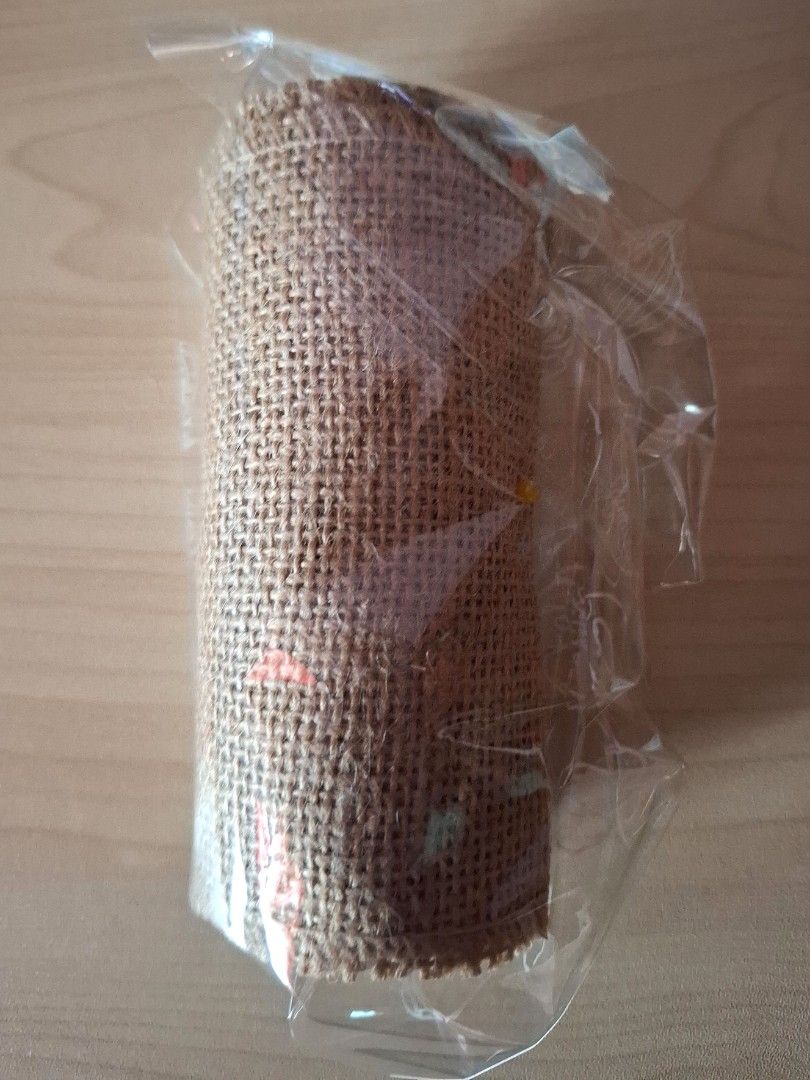 2Meters Jute Fabric Burlap Roll (Category: Storage Boxes & Baskets) located in Quezon City. Submitted by an.marie (Listing ID 1427484019, Image 1). Description: Burlap roll is perfect for various crafts and decorations. It measures 12cm in width and 2 meters in length. The roll is made of a natural, woven material. It is suitable for rustic-themed events, DIY projects, or adding a touch of texture to your creations. The roll is still in its origi