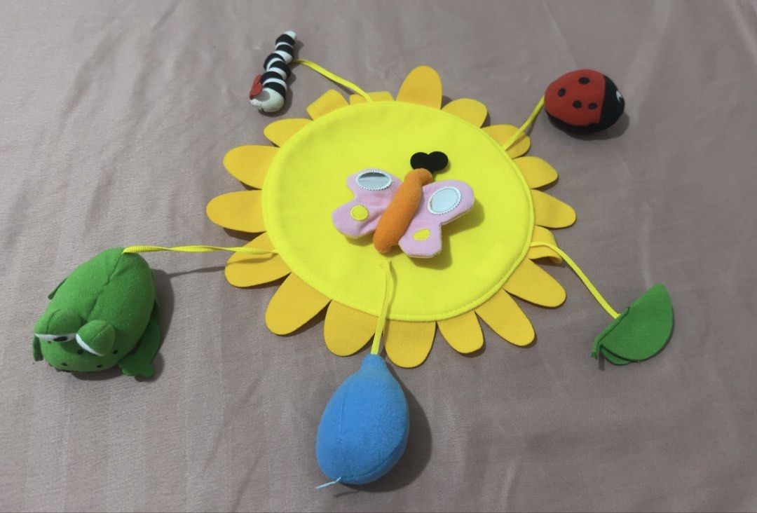 Baby Soft Toy - Sunflower Design (Category: Infant Playtime) located in Manila. Submitted by ef642543 (Listing ID 1427425022, Image 2). Description: (Baby Crib & Stroller Mobile】0-1 Year Infant Spinning Wind Chime Toy · Tummy Time Visual Tracking Toy · Multi-Scene Soothing Rattle Hanger.
